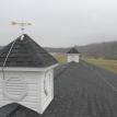 Weathervanes  are bonded to the lightning rod system