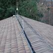 Lightning rod system installed with a vented ridge back side photo #1